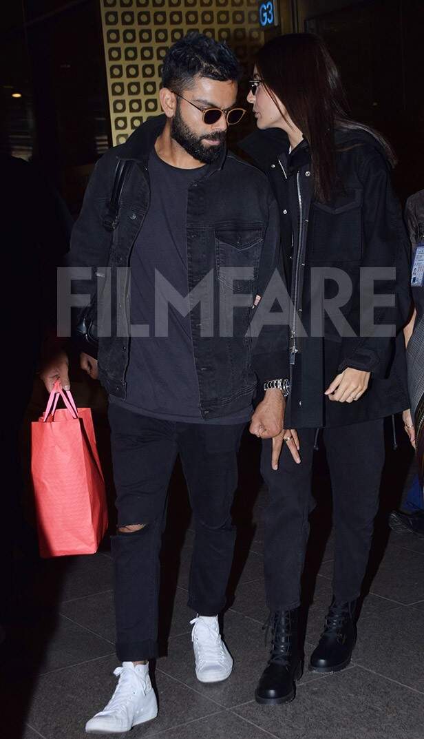 Photos: Virat Kohli And Anushka Sharma Twin In Black | Filmfare.com