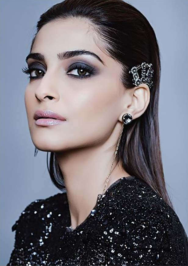 Sonam Kapoor sports loose natural waves with side braides - Witty Vows