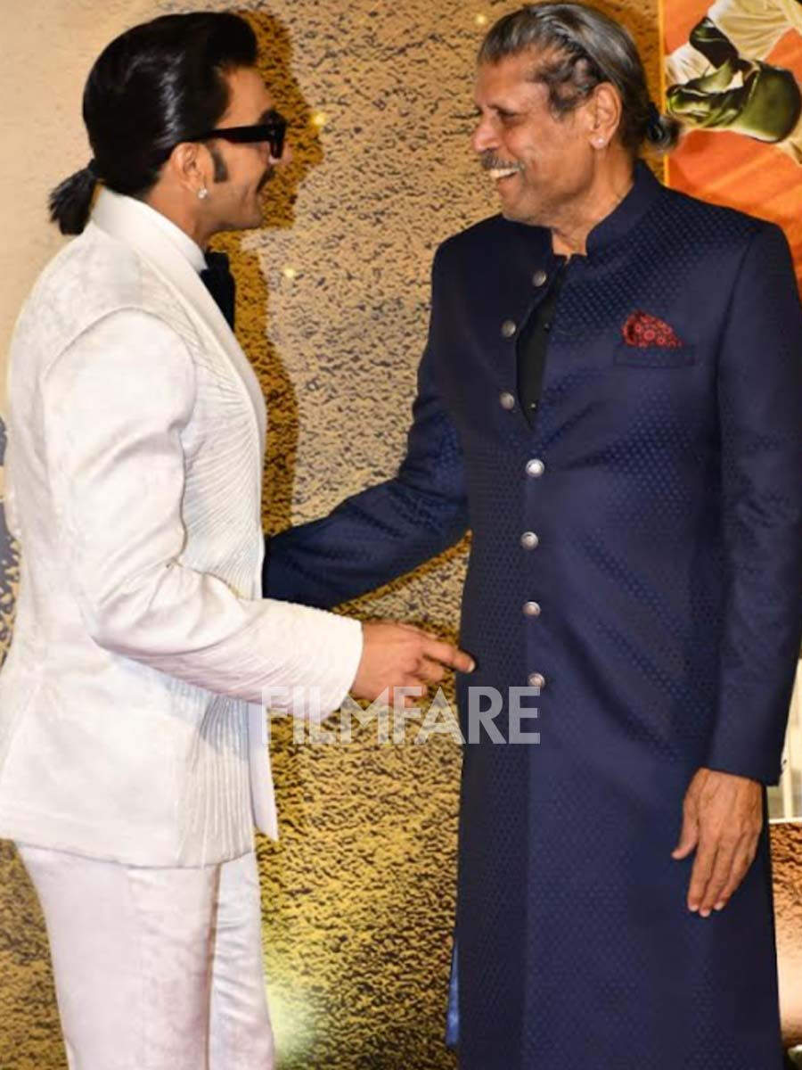 Pictures: Kapil Dev, Ranveer Singh hug it out at 83 special