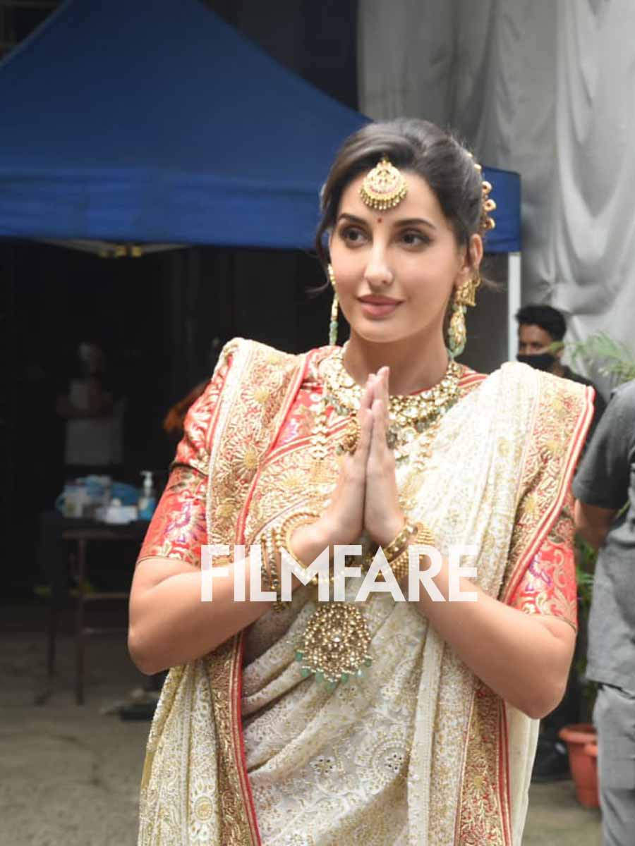 Pictures: Nora Fatehi goes traditional in a Bengali saree | Filmfare.com