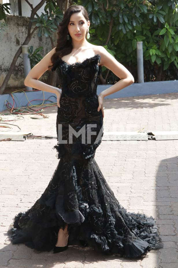 Nora Fatehi stuns in a classic black gown on the sets of a dance ...