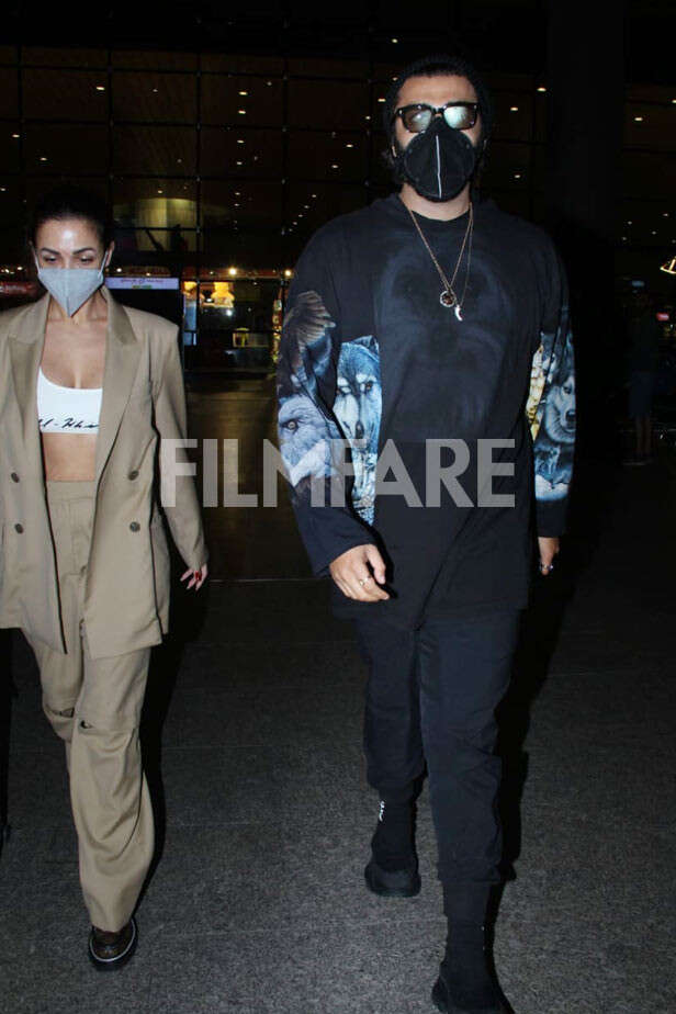 Malaika Arora And Arjun Kapoor Return From Paris In Style. See Pics ...