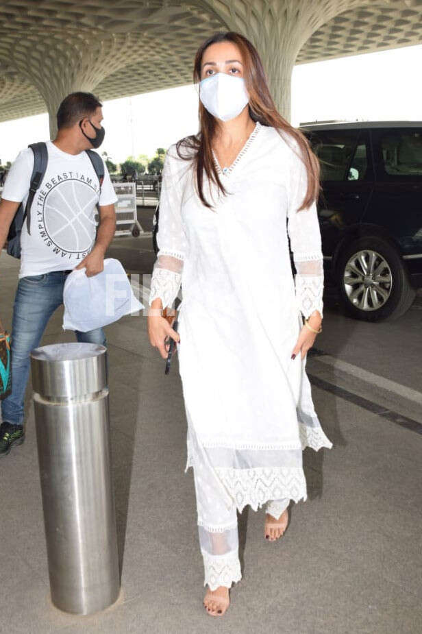 Malaika Arora clicked in white ethnic go well with on the airport 2 Malaika Arora