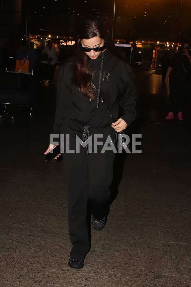 Nora Fatehi Amps Up Her Airport Look With All-Black Attire, Her Rs