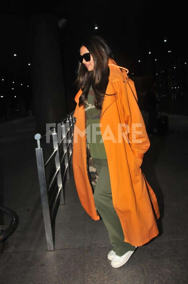 IN PICS: Deepika Padukone oozes oomph as she arrives wearing an oversized  camo jacket at the airport