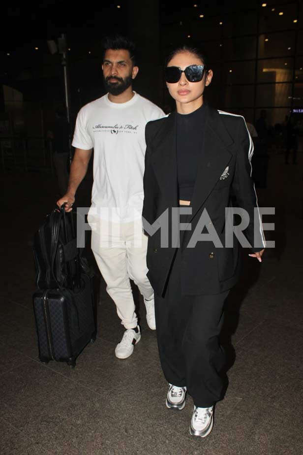 Mouni Roy and Suraj Nambiar clicked arriving at the airport today ...