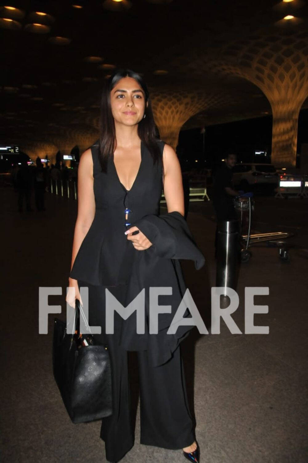 Mrunal Thakur Looks Gorgeous In A Black Outfit At The Airport Ahead Of