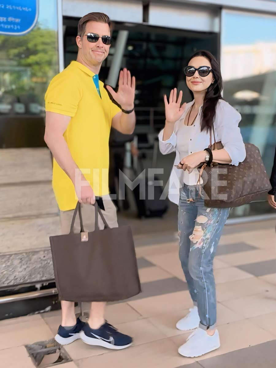 Preity Zinta gets clicked at the airport with her husband Gene Goodenough.  See pics: | Filmfare.com