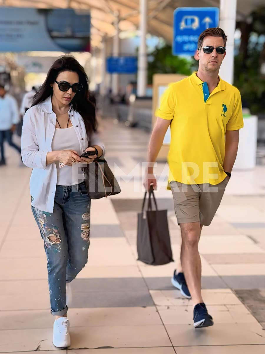 Preity Zinta gets clicked at the airport with her husband Gene Goodenough.  See pics: | Filmfare.com