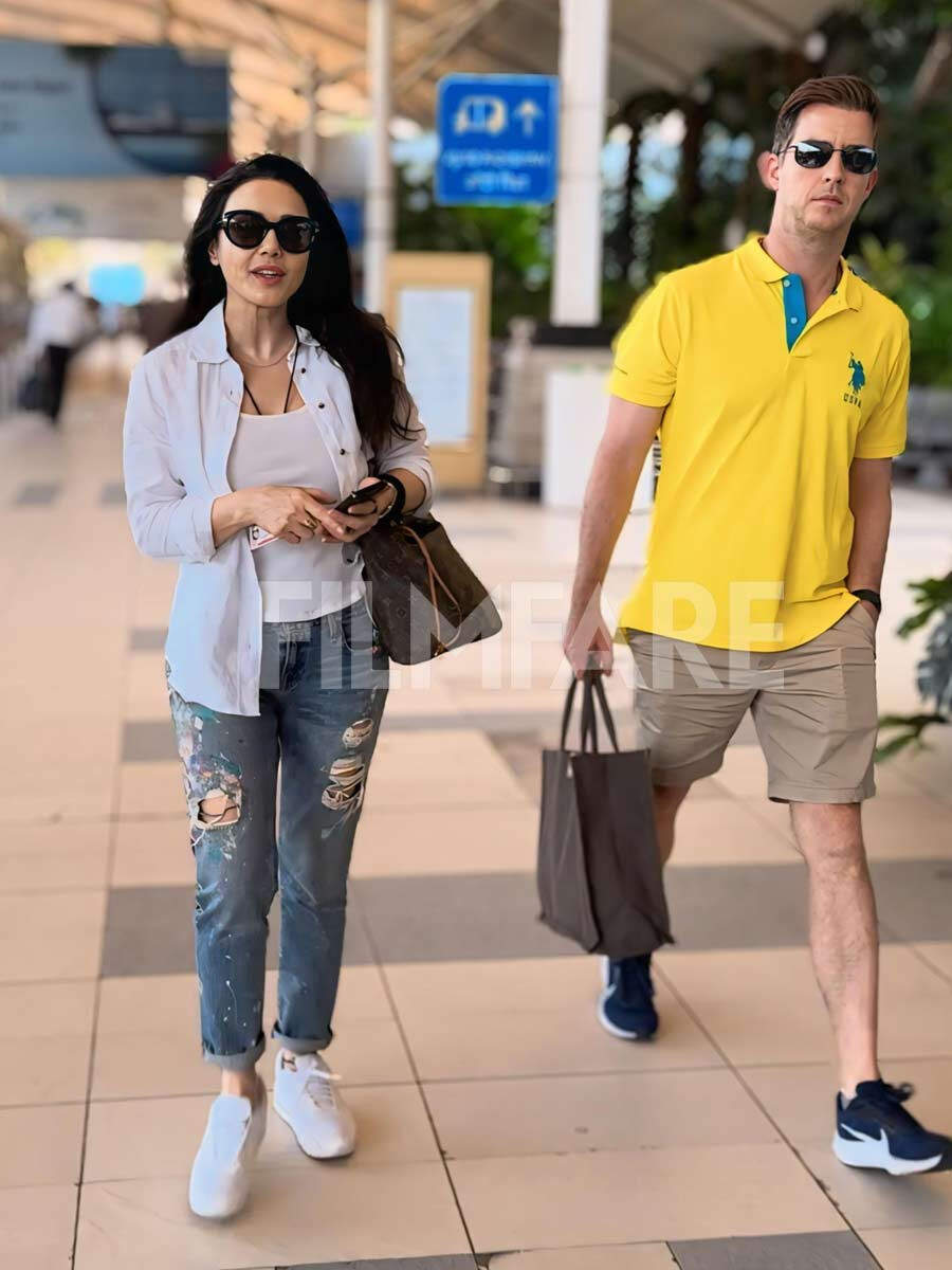 Preity Zinta gets clicked at the airport with her husband Gene Goodenough.  See pics: | Filmfare.com