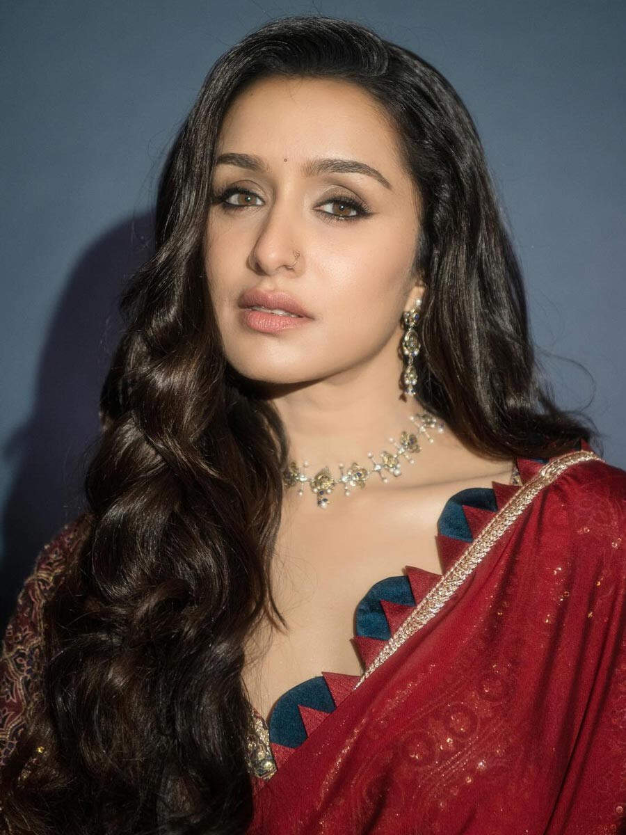 Photos: Shraddha Kapoor paints the town red in a satin saree | Filmfare.com