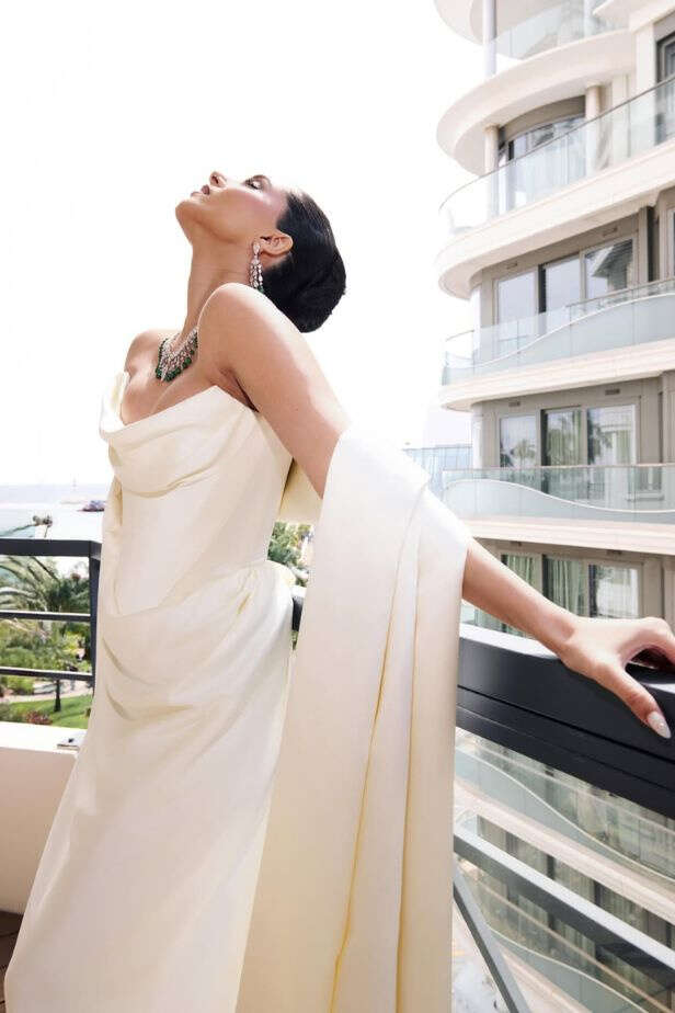 Tara Sutaria Stuns in Ivory Satin Gown with Emerald Jewels at Cannes