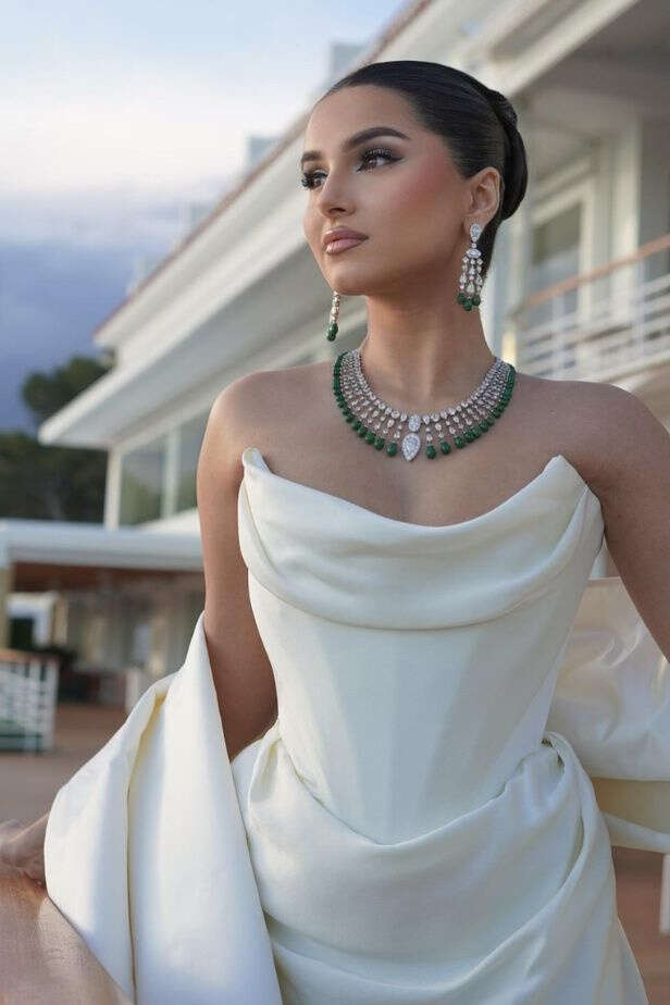 Tara Sutaria Stuns in Ivory Satin Gown with Emerald Jewels at Cannes