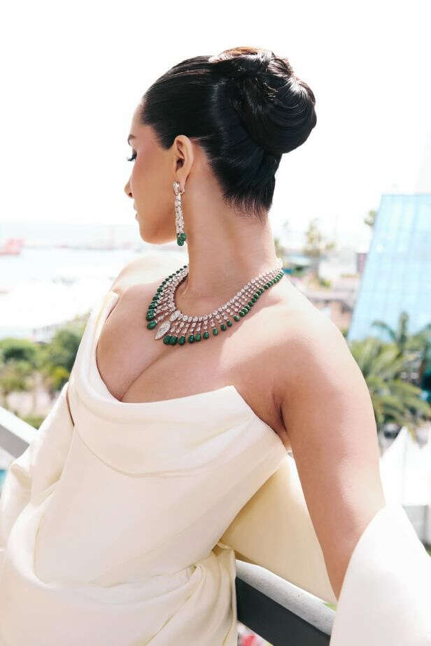 Tara Sutaria Stuns in Ivory Satin Gown with Emerald Jewels at Cannes