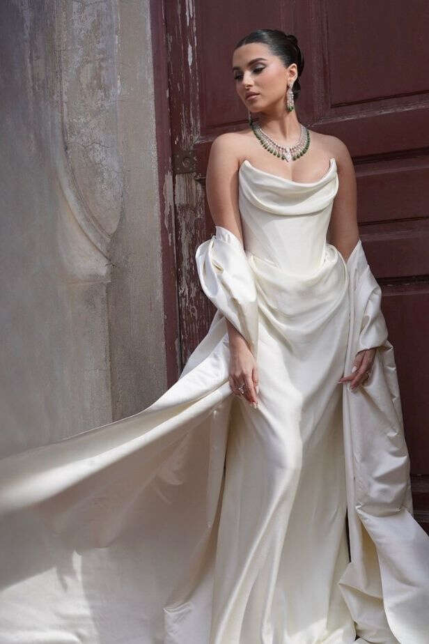Tara Sutaria Stuns in Ivory Satin Gown with Emerald Jewels at Cannes