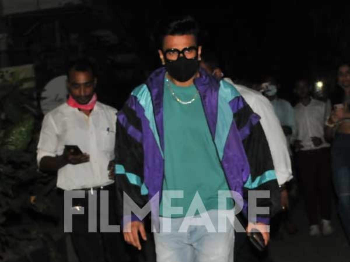 Ranveer Singh looks dapper in a blue suit as he poses for the paparazzi